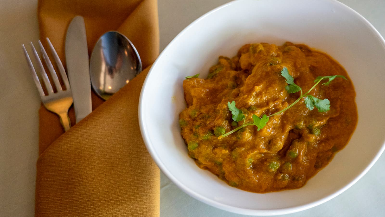 Aloo matar — peas and potatoes in a light sauce